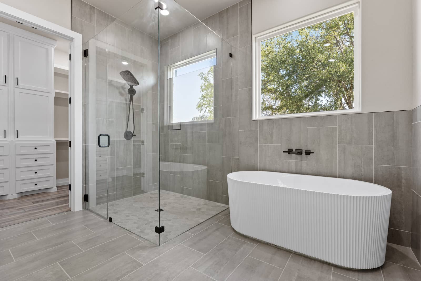 Freestanding tub and glass shower at 258 Sunday Drive