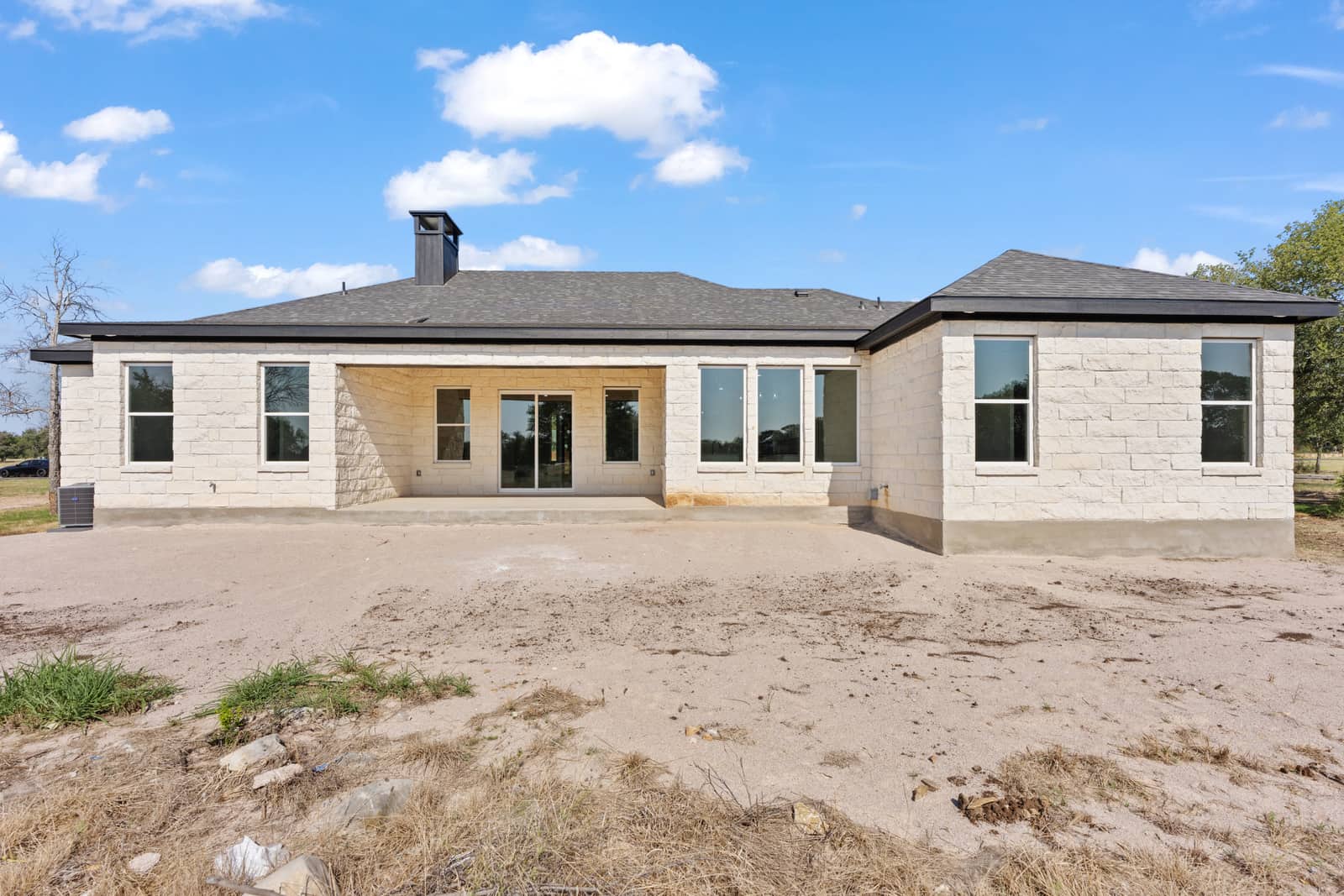 Covered rear porch and back exterior at 258 Sunday Drive