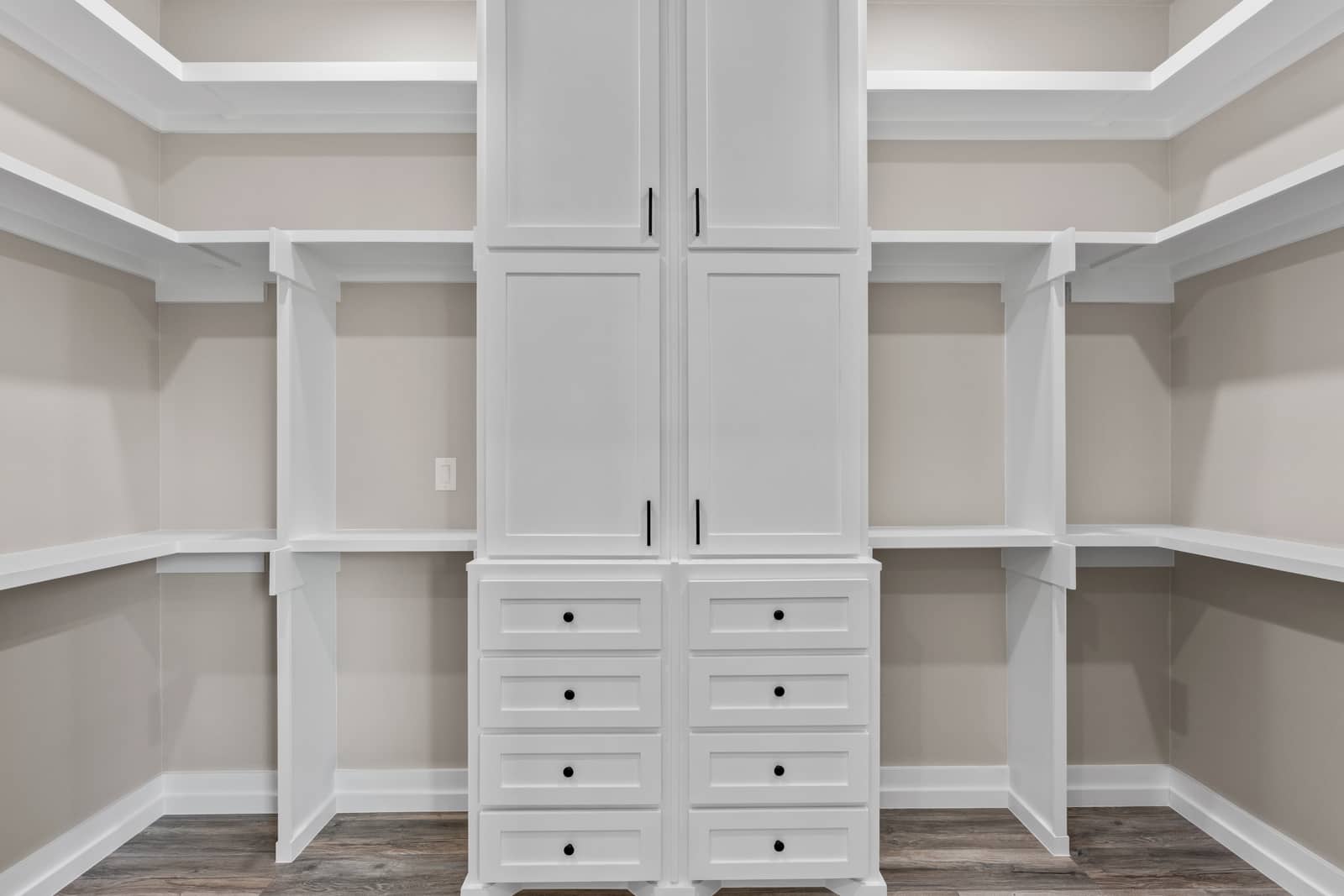 Walk-in closet with built-in drawers and shelving at 258 Sunday Drive