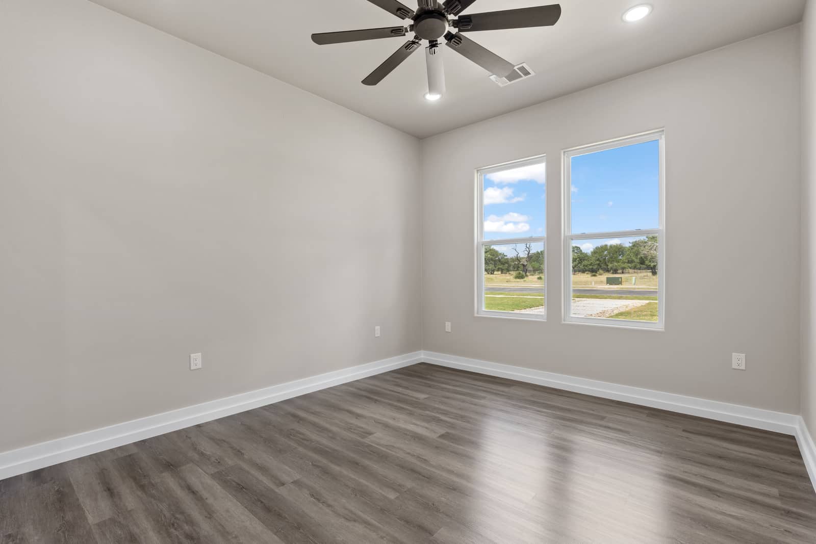 Secondary bedroom overlooking the neighborhood at 262 Sunday Drive