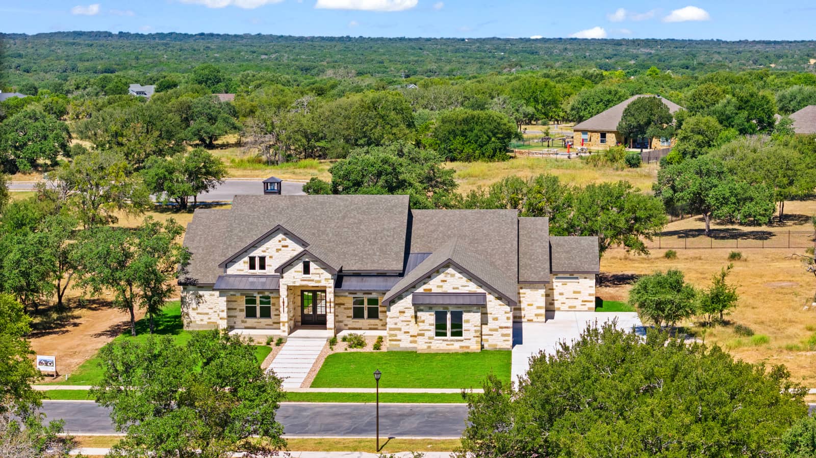 Aerial front view of the home mapped to 265 Sunday Drive