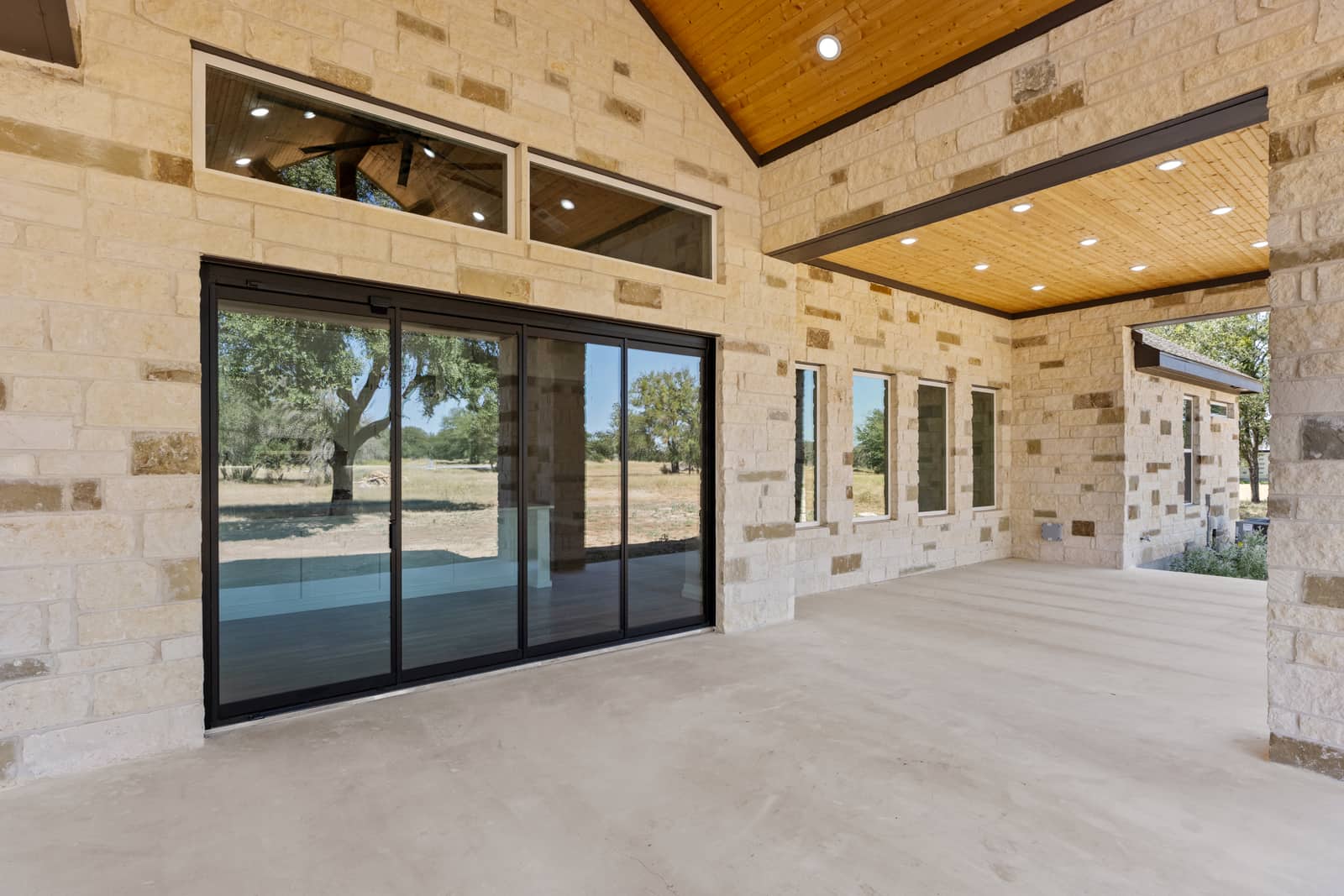 Stone and wood covered patio mapped to 265 Sunday Drive