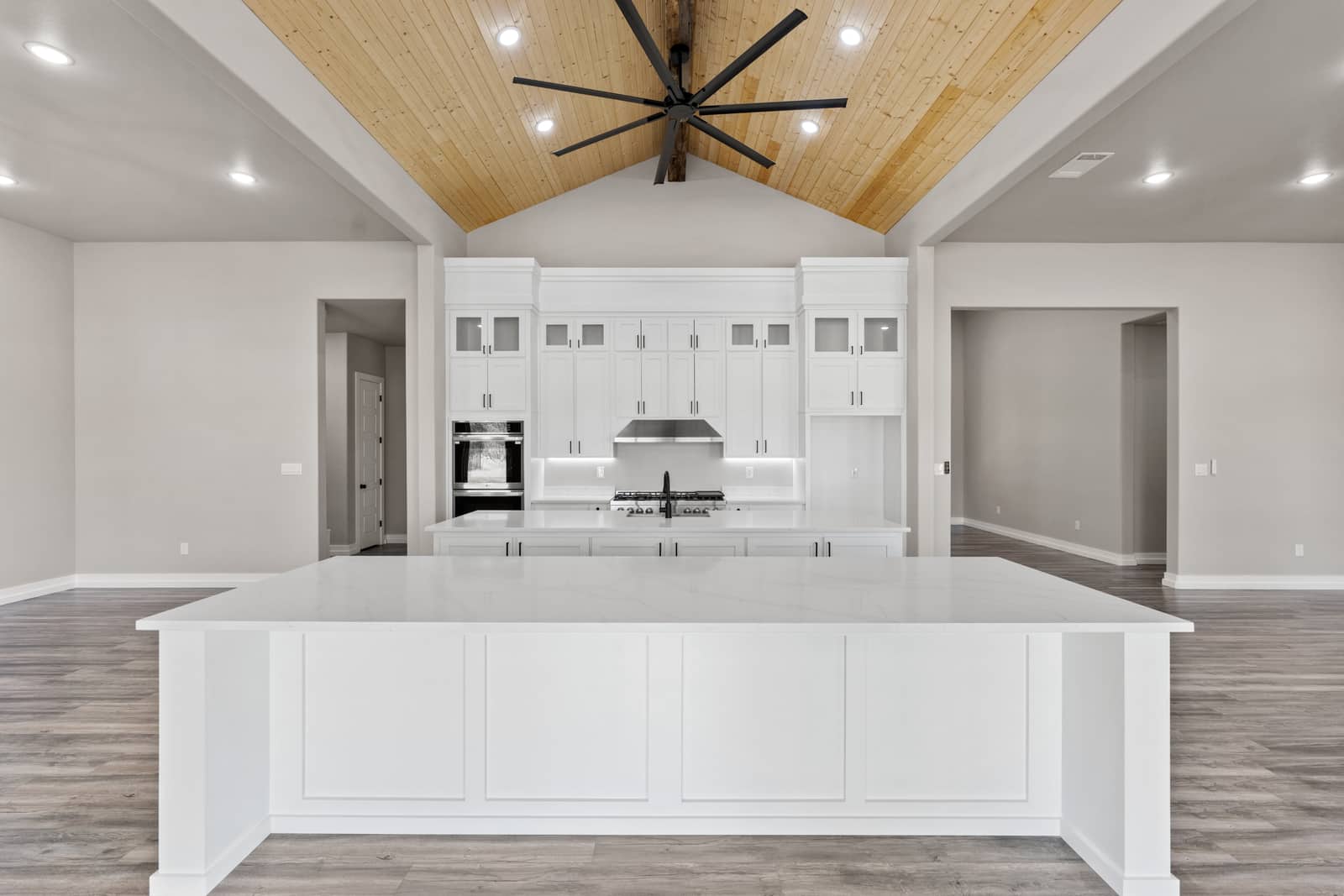 White kitchen beneath a wood ceiling mapped to 265 Sunday Drive