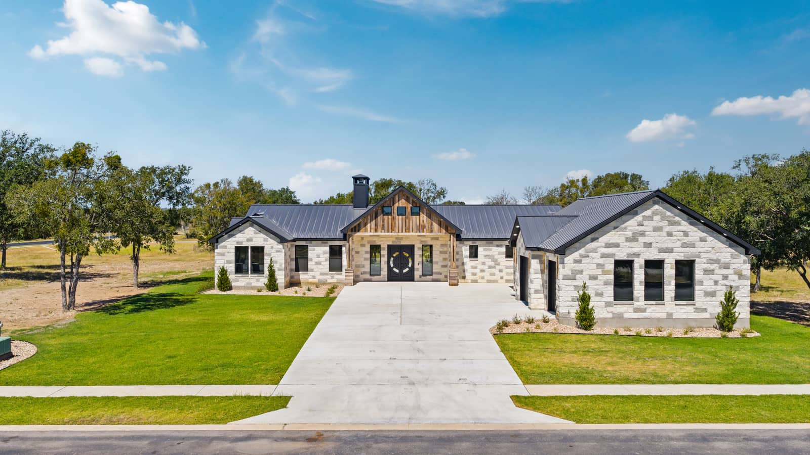 Front aerial view of the model home at 271 Sunday Drive